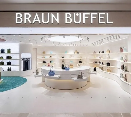 Braun Büffel Kuala Lumpur store design with innovative LED screen, attracting Millennial shoppers.